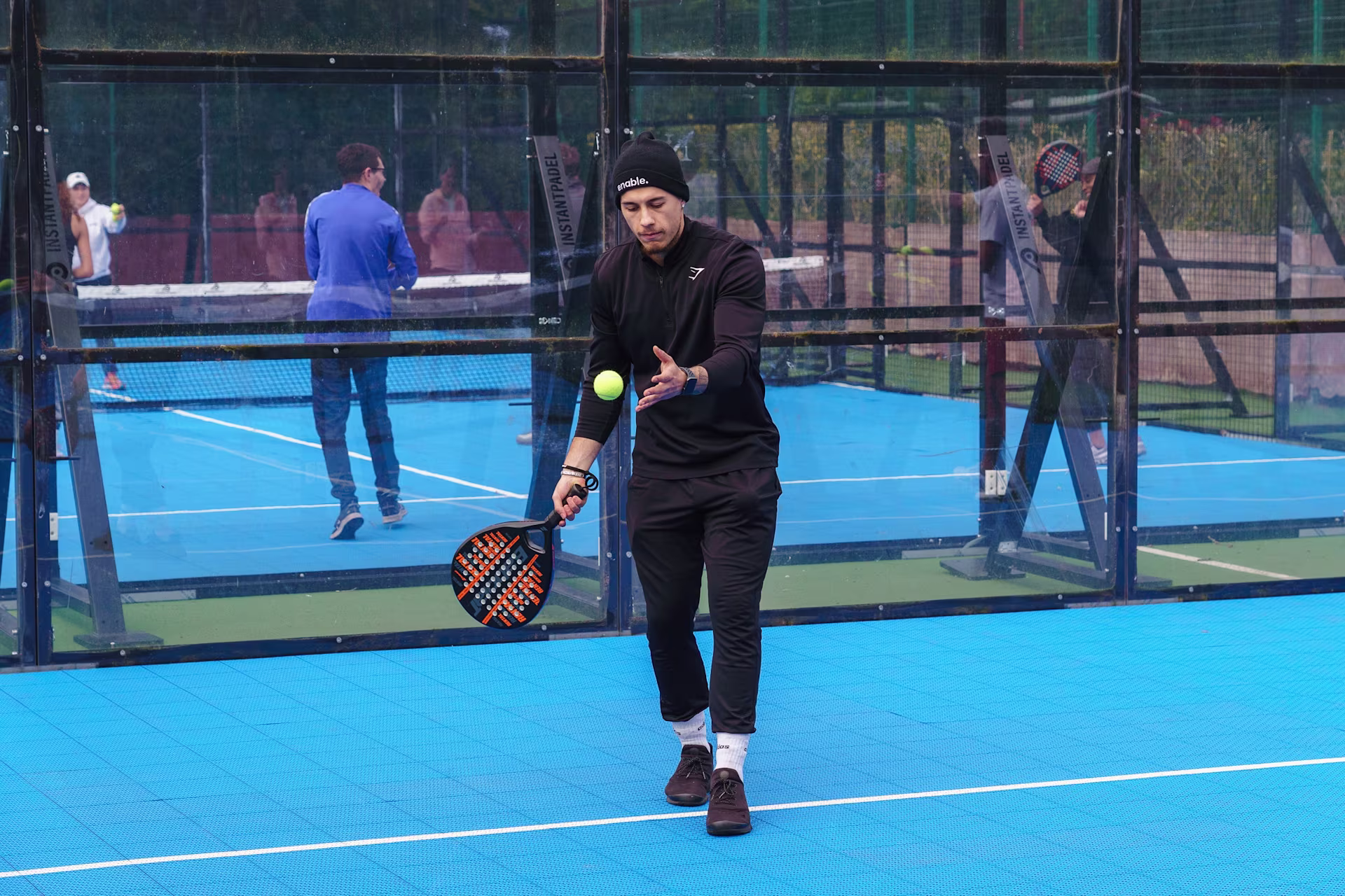 Padel coach answering common questions about Lob