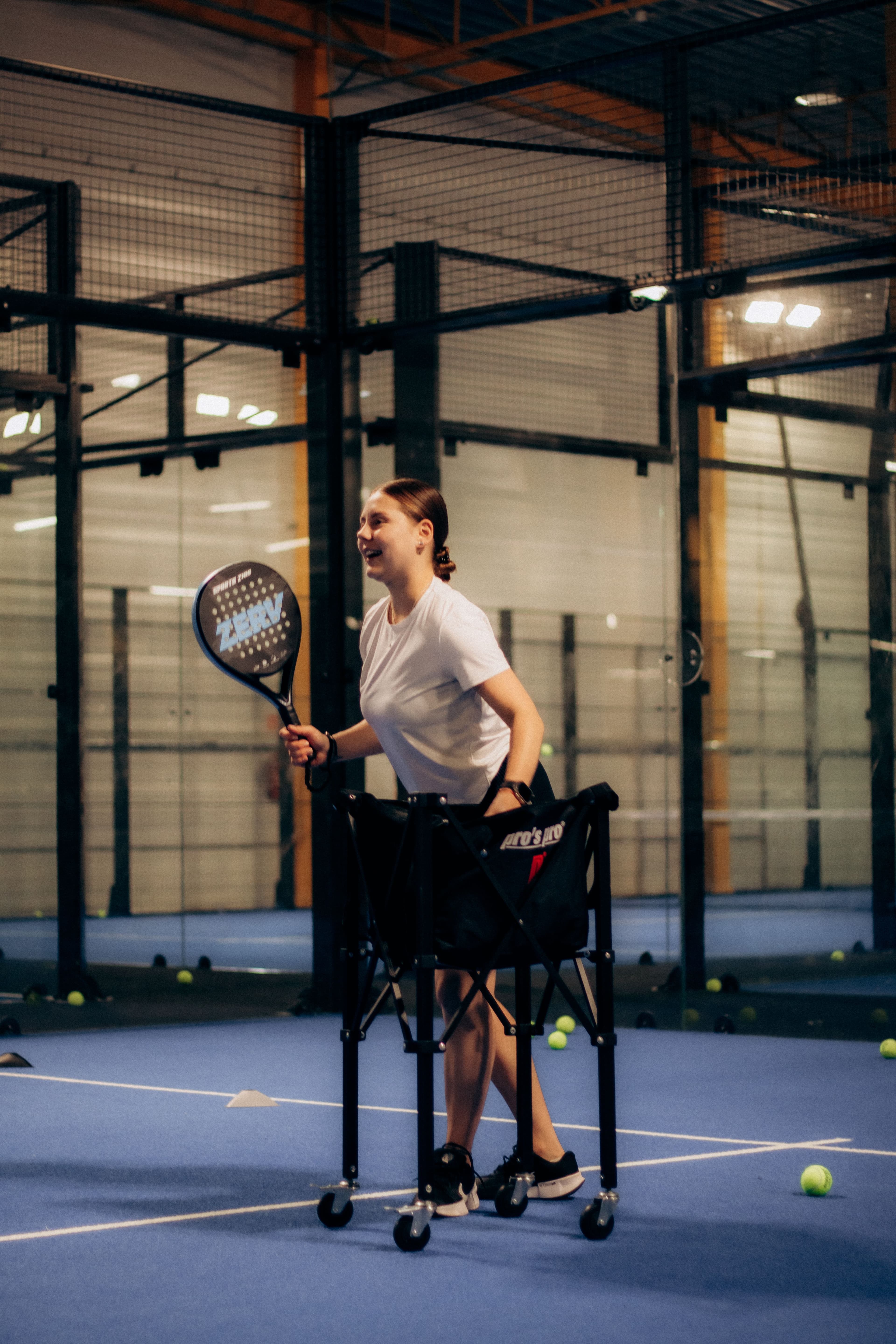 Coach leading a padel session on Lob